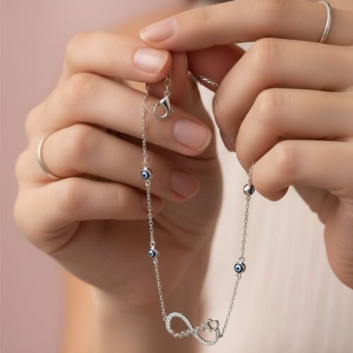 Infinity Heart Silver Anklet for Women show in women hand