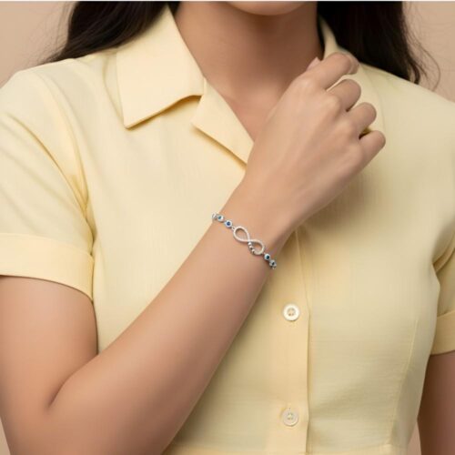 Silver Infinity Bracelet with Blue Evil Eye Charms wear women hand