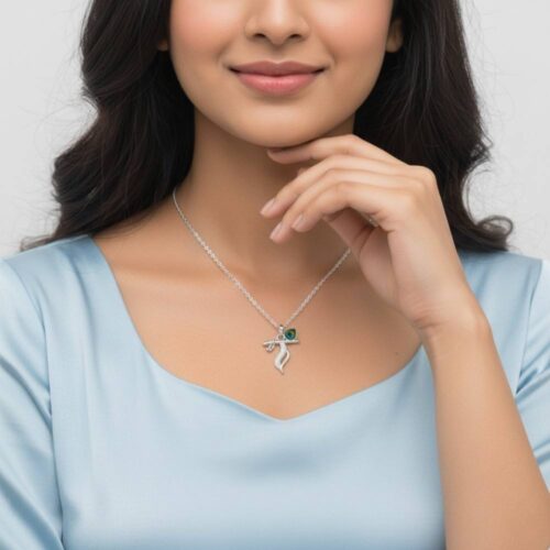 Woman wearing silver Krishna pendant necklace with elegant peacock feather design