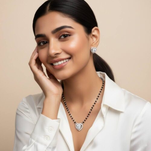 Heart shape silver mangalsutra worn by model showing elegant neck fit