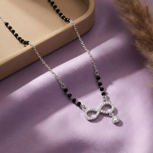 Trendy Infinity Mangalsutra Design placed on aesthetic purple background