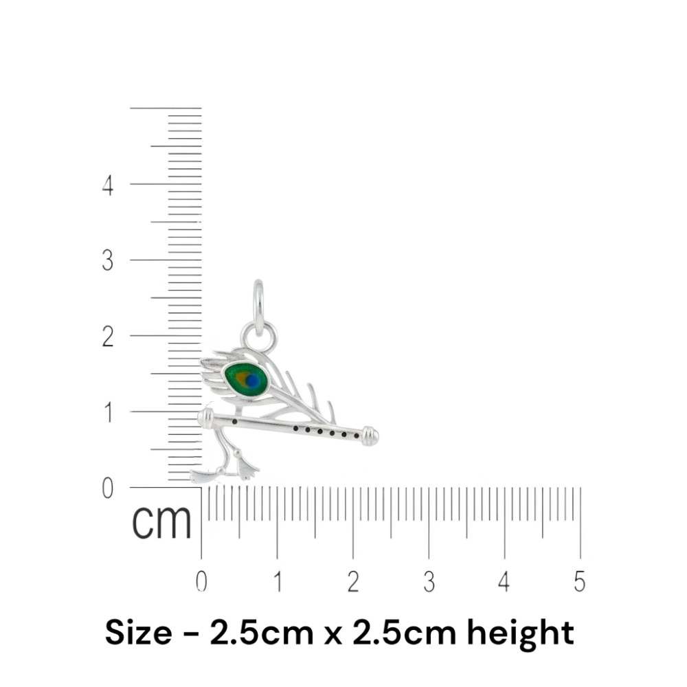 krishna-flute-pendant-size-2.5-cm-925-silver Krishna flute pendant in silver showing exact size 2.5 cm by 2.5 cm with ruler reference