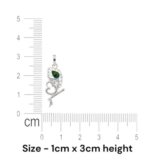 Krishna peacock feather pendant showing exact size 1 cm by 3 cm with ruler reference