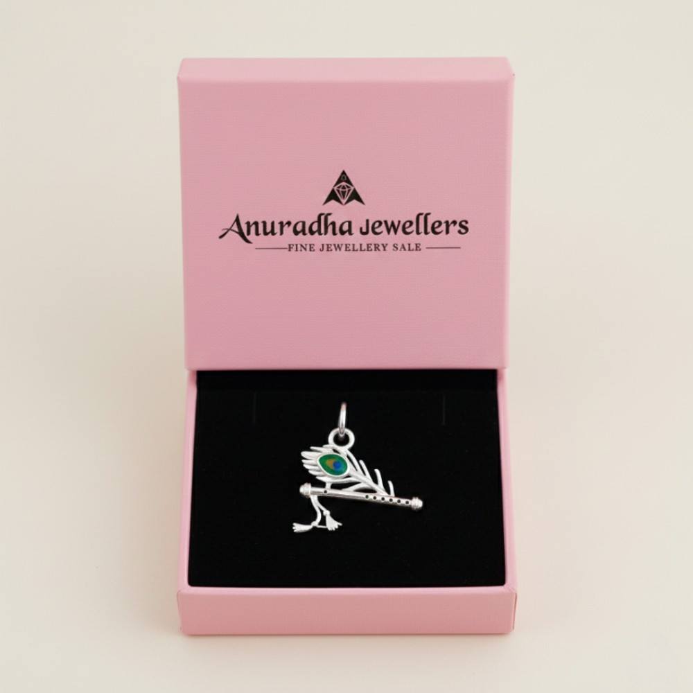 krishna-peacock-pendant-silver-gift-box-anuradha-jewellers Krishna peacock pendant placed in Anuradha Jewellers premium gift box