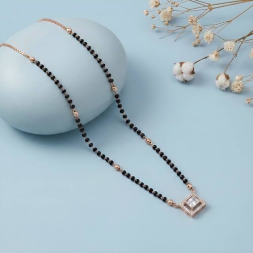Rose Gold Square Silver Mangalsutra with black beads chain styled in flat lay photography