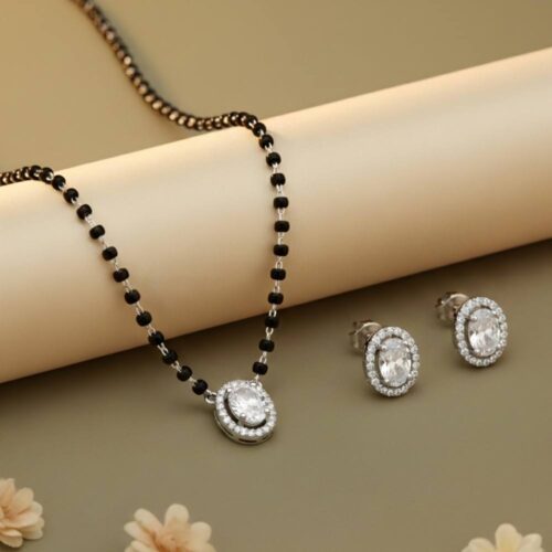 Silver oval mangalsutra with solitaire pendant and matching earrings