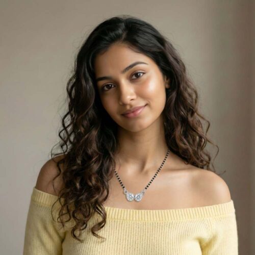 Silver tear drop mangalsutra worn by model with modern ethnic styling