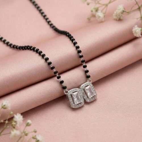 Modern silver mangalsutra design with twin emerald cut CZ pendant and black beads chain