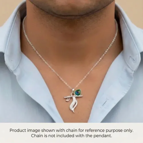 Man wearing the silver Krishna Pendant styled with a chain to show the neckline fit. Product image for reference, chain is not included.