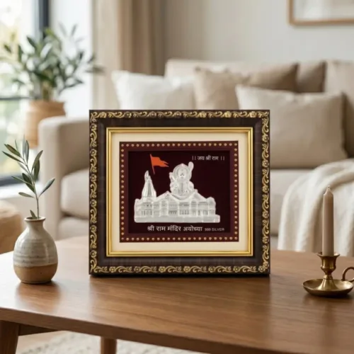 Beautiful silver ayodhya ram mandir frame for home placed elegantly on a wooden table in a living room
