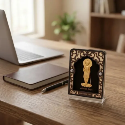 Beautiful 24kt gold jalaram bapa frame placed elegantly on an office desk or shop cash counter to invite prosperity