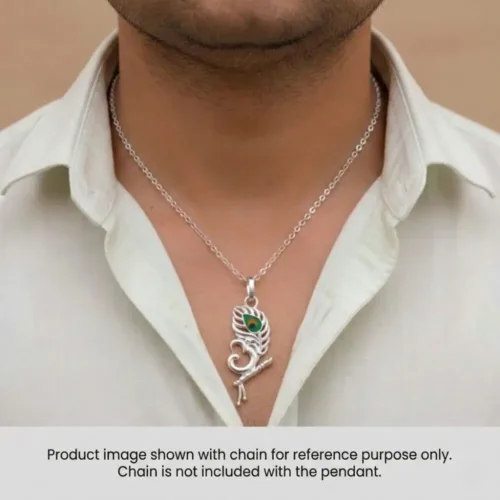 Man wearing the om bansuri pendant to showcase the neckline fit. Product image shown with a chain for reference purposes only; chain is not included.