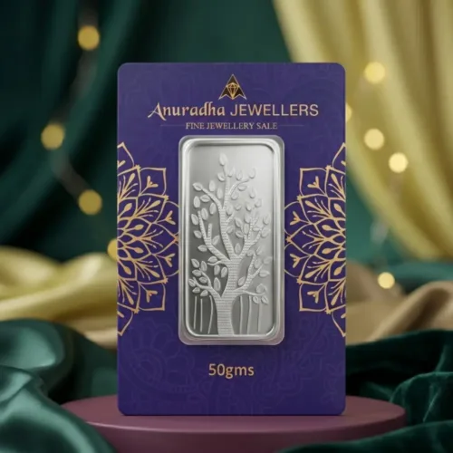 Premium purple tamper-proof packaging of the 50 gm silver biscuit by Anuradha Jewellers
