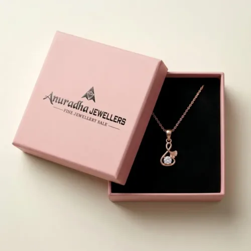 Premium pink Anuradha Jewellers box presenting the beautiful 925 Silver Rose Gold Solitaire Pendant Necklace for gifting