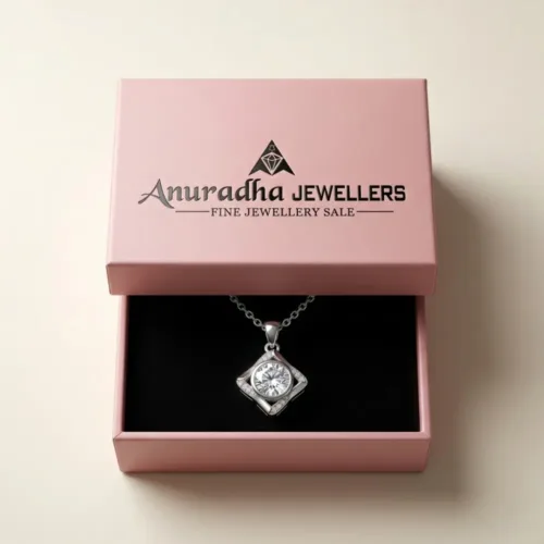 Premium pink Anuradha Jewellers box presenting the beautiful silver american diamond necklace making it a perfect gift