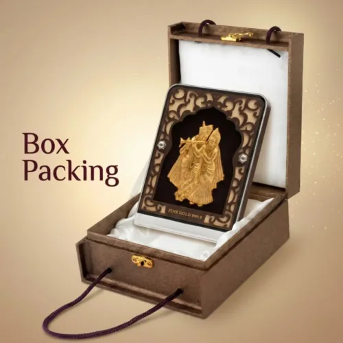 Luxurious brown box packaging presenting the beautiful radha krishna gold frame for wedding gift
