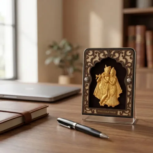 Beautiful pure gold god frame for puja room and office desk decor resting elegantly on a wooden table