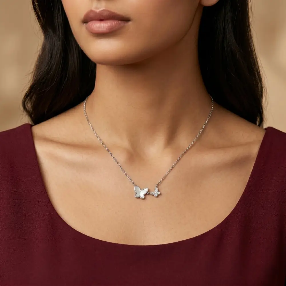 Silver Daily Wear Butterfly Necklace Elegant woman wearing the silver daily wear butterfly necklace for women paired with a beautiful maroon dress