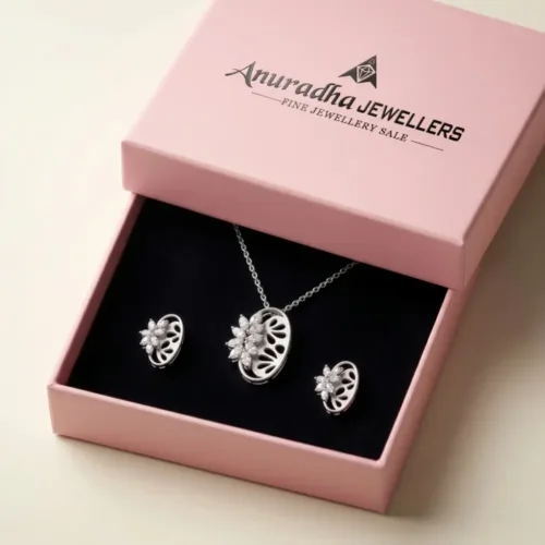 Premium pink Anuradha Jewellers packaging beautifully showcasing the crystal necklace and earrings set gift for her