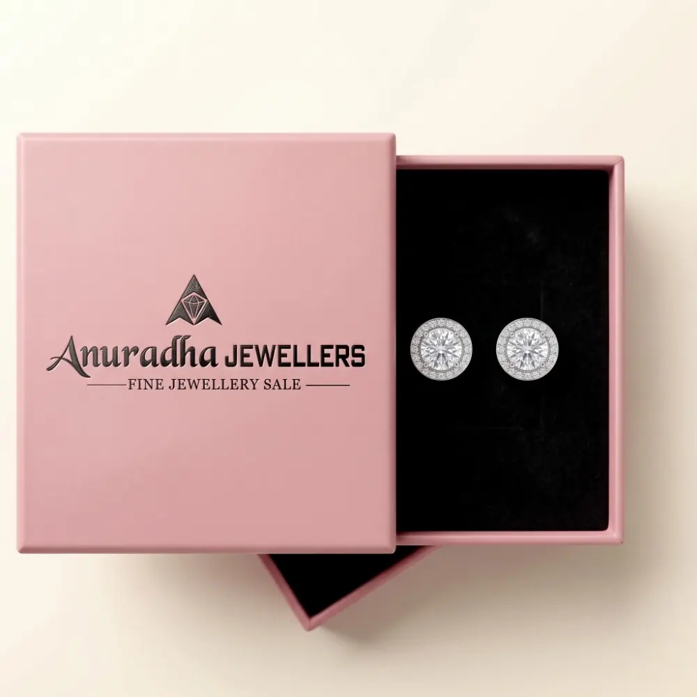 Silver Solitaire Halo Earrings Gift Box The premium silver solitaire halo earrings beautifully presented inside the signature pink Anuradha Jewellers gift box on a black velvet tray, ready for luxury gifting.