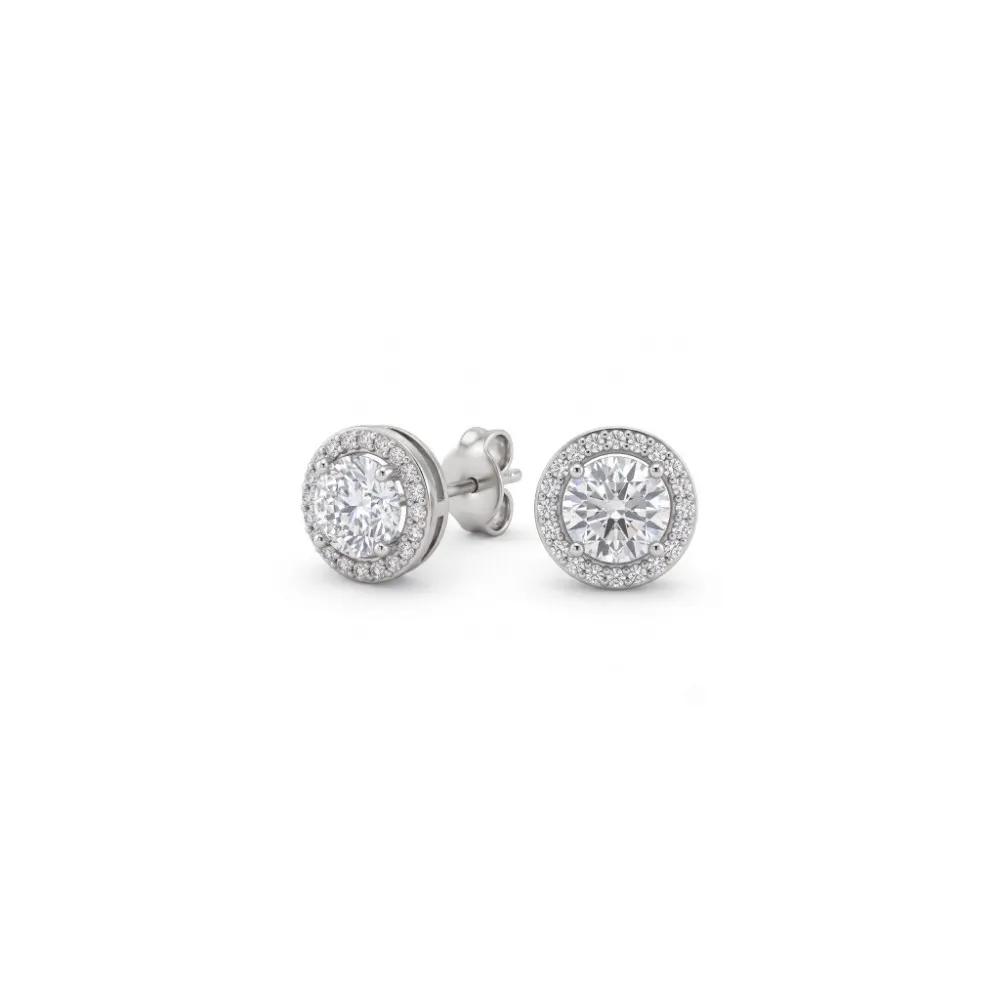 925 Silver Halo Stud Earrings Studio front and angled view of the 925 silver halo stud earrings on a clean white background, showcasing the classic four-prong setting and sparkling pavé border.