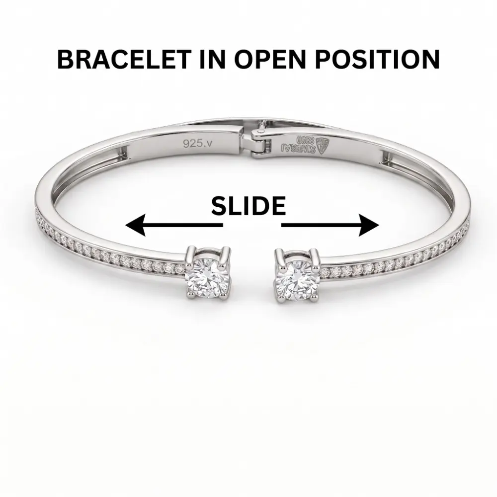 Silver Hinged Bangle Bracelet Mechanism Infographic demonstrating the silver hinged bangle bracelet in an open position, clearly illustrating the practical slide mechanism for easy and comfortable wear.