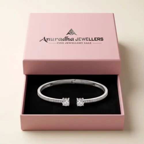 The stunning silver open cuff bangle bracelet securely packaged inside the premium pink Anuradha Jewellers gift box, perfectly presented for romantic gifting.