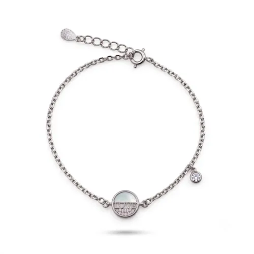 Delicate silver love bracelet for women featuring an authentic mother of pearl centerpiece and subtle cubic zirconia dangling charm.