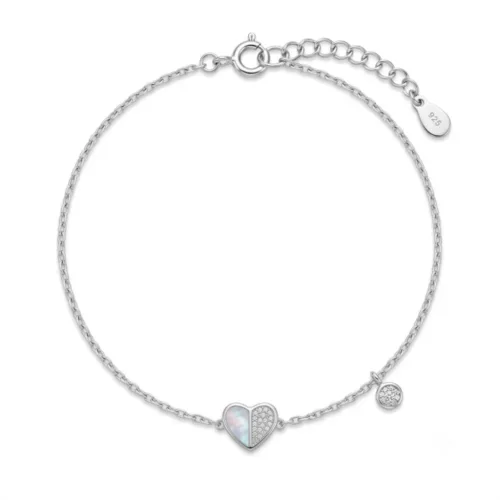 Pure silver heart bracelet featuring a unique split mother of pearl and cubic zirconia design on a clean white background.