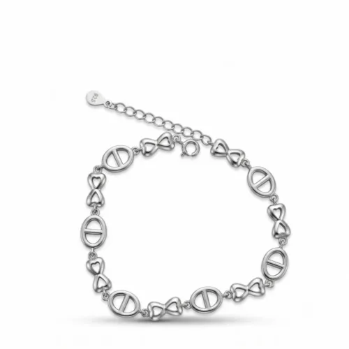 Close-up of the 925 sterling silver bow bracelet for women featuring an alternating romantic bow and classic buckle link design on a clean white background.