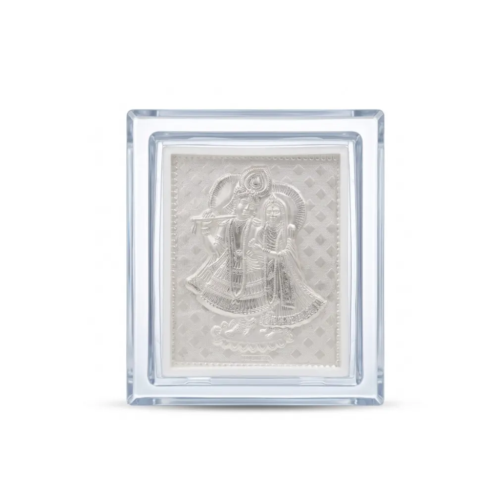 Small Silver Radha Krishna Frame Front view of the small silver radha krishna frame in 999 pure silver, enclosed in a premium clear acrylic case.