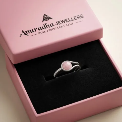 The premium pink mother of pearl silver ring beautifully presented inside the signature pink Anuradha Jewellers gift box on a soft black velvet cushion, completely gift-ready.