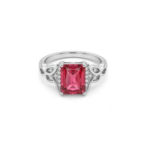Front studio view of the emerald cut red stone silver ring on a clean white background, highlighting the bold rectangular shape and intricate side details.