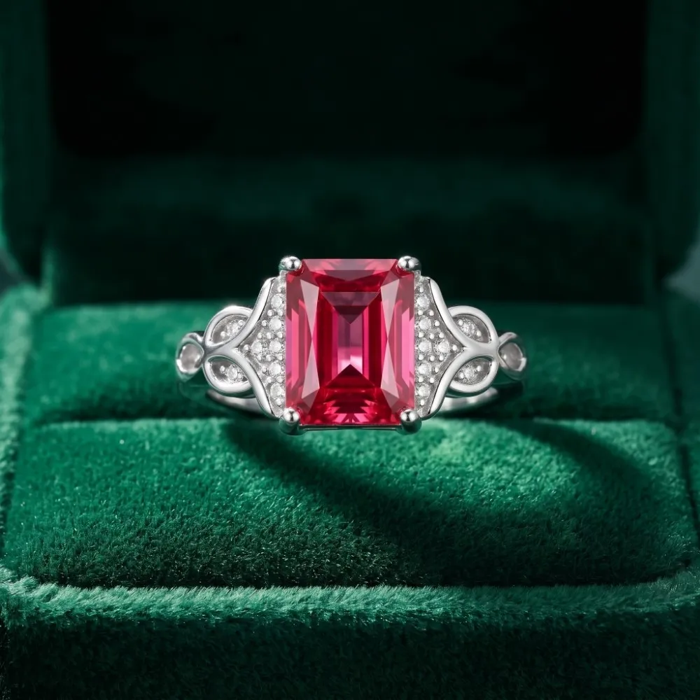 Rectangle Red Stone Ring in Velvet Box The premium rectangle red stone ring silver beautifully displayed inside a luxurious green velvet box, showcasing its vibrant ruby-red center gem.
