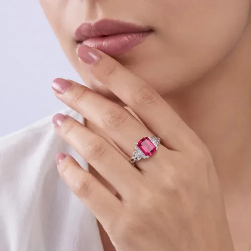 Elegant model wearing the vintage style red stone ring, demonstrating the bold, royal statement look and comfortable fit on the finger.