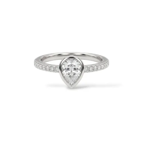 Front studio view of the elegant bezel set pear shaped ring on a clean white background, showcasing the brilliant center stone and delicate pavé band details.